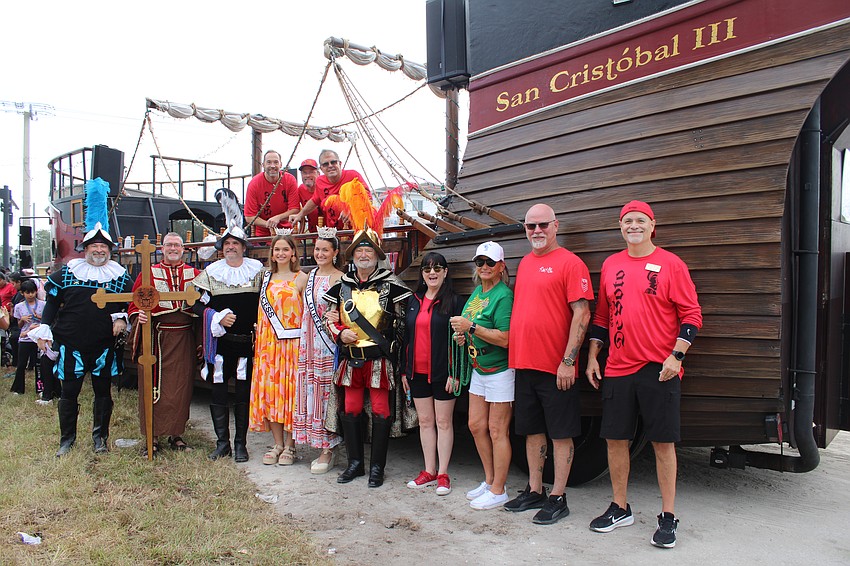 The fearsome crew of the San Cristobal III float, operating as part of the Hernando De Soto Historical Society, sailed Santa Claus safely to shore at Stillpoint Mission for the organization's annual holiday giveaway on Dec. 6.