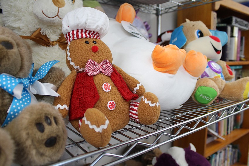 Cuddly plush toys, rad robot cars and intriguing board games went home with the approximately 400 children attending Stillpoint Mission's holiday giveaway this year.