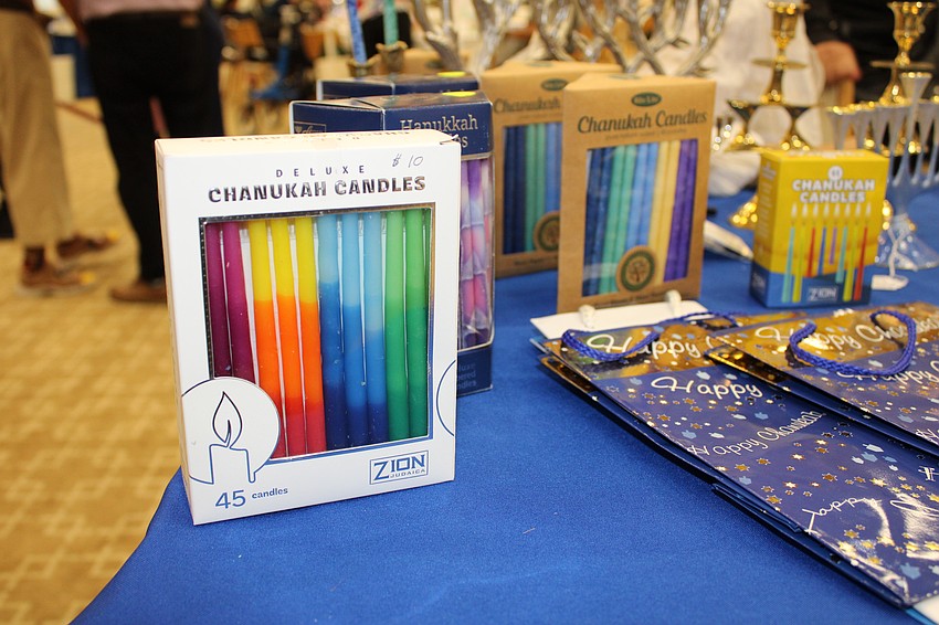 Visitors to the holiday market inside Temple Beth Israel's Hanukkah open house could find candles, menorahs and other goods for the holidays.