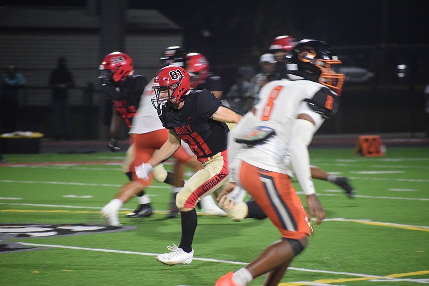 Mason Jordan (81) begins his route as the Cougars look to cross midfield. As of Dec. 8, he holds 21 offers from college football programs at varying levels, but did not sign during the NCAA's early signing period from Dec. 3 to 5. Mason Jordan (81) begins his route as the Cougars look to cross midfield. As of Dec. 8, he holds 21 offers from college football programs at varying levels, but did not sign during the NCAA's early signing period from Dec. 3 to 5.