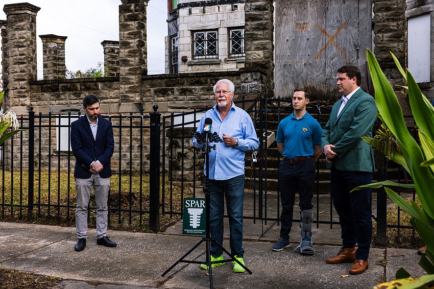Historian Wayne Wood speaks in front of the Drew Mansion at 245 W. Third St. in Springfield. At his right are Council member Jimmy Peluso and Tyler Grant, SPAR board president. Historian Wayne Wood speaks in front of the Drew Mansion at 245 W. Third St. in Springfield. At his right are Council member Jimmy Peluso and Tyler Grant, SPAR board president.