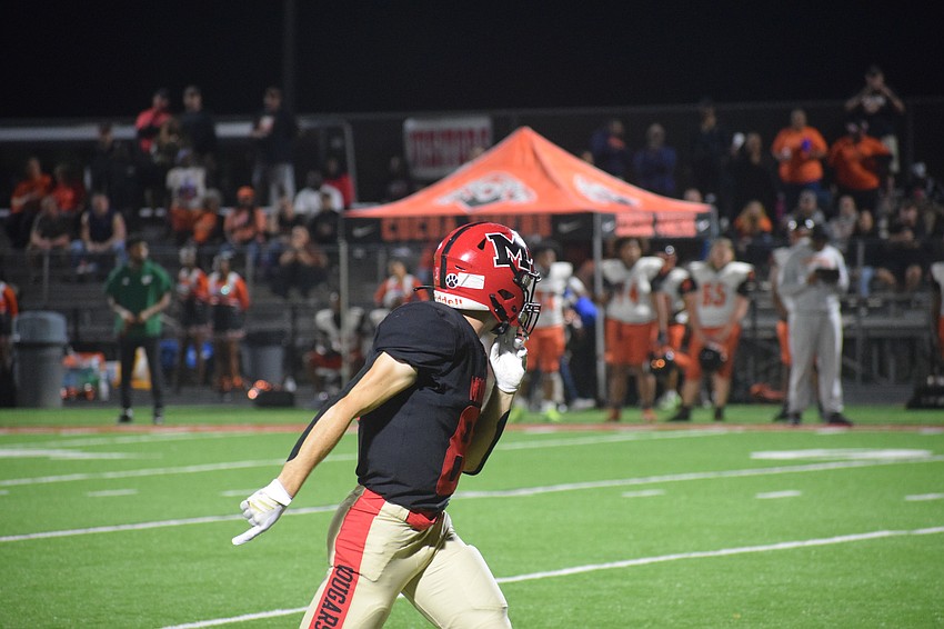 Mason Jordan lines up in the slot before a play during the FHSAA Class 2A state semifinal on Dec. 5 between Cardinal Mooney and Cocoa. He tallied five receptions and 32 yards that night while blocking the fifth punt of his career. Mason Jordan lines up in the slot before a play during the FHSAA Class 2A state semifinal on Dec. 5 between Cardinal Mooney and Cocoa. He tallied five receptions and 32 yards that night while blocking the fifth punt of his career.
