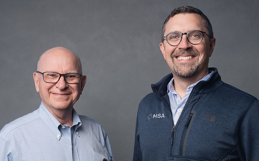 Haddad Engineering President Namir Haddad and MSA Professional Services Inc. CEO Nick Wagner.