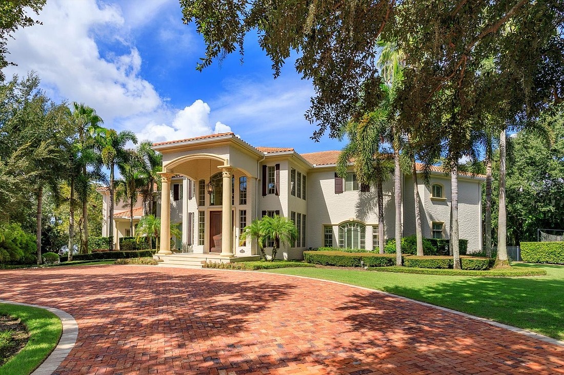 The home at 9935 Lake Louise Drive, Windermere, sold Dec. 2, for $11,100,000. This lakefront estate is positioned on 2.14 acres along Lake Louise. The sellers were represented by Jill Irwin, Irwin Realty Group LLC.