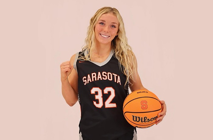 Paisley Binswanger poses for a photo. The four-year varsity player hopes to reach 1,500 points and 300 assists by the time her career with Sarasota High girls basketball concludes in February 2026.
