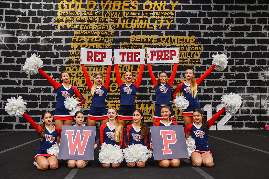Windermere Prep’s competitive cheer team is fully unified in its goal to win states.  The girls added white pompoms to enhance the cleanness of their presentation.