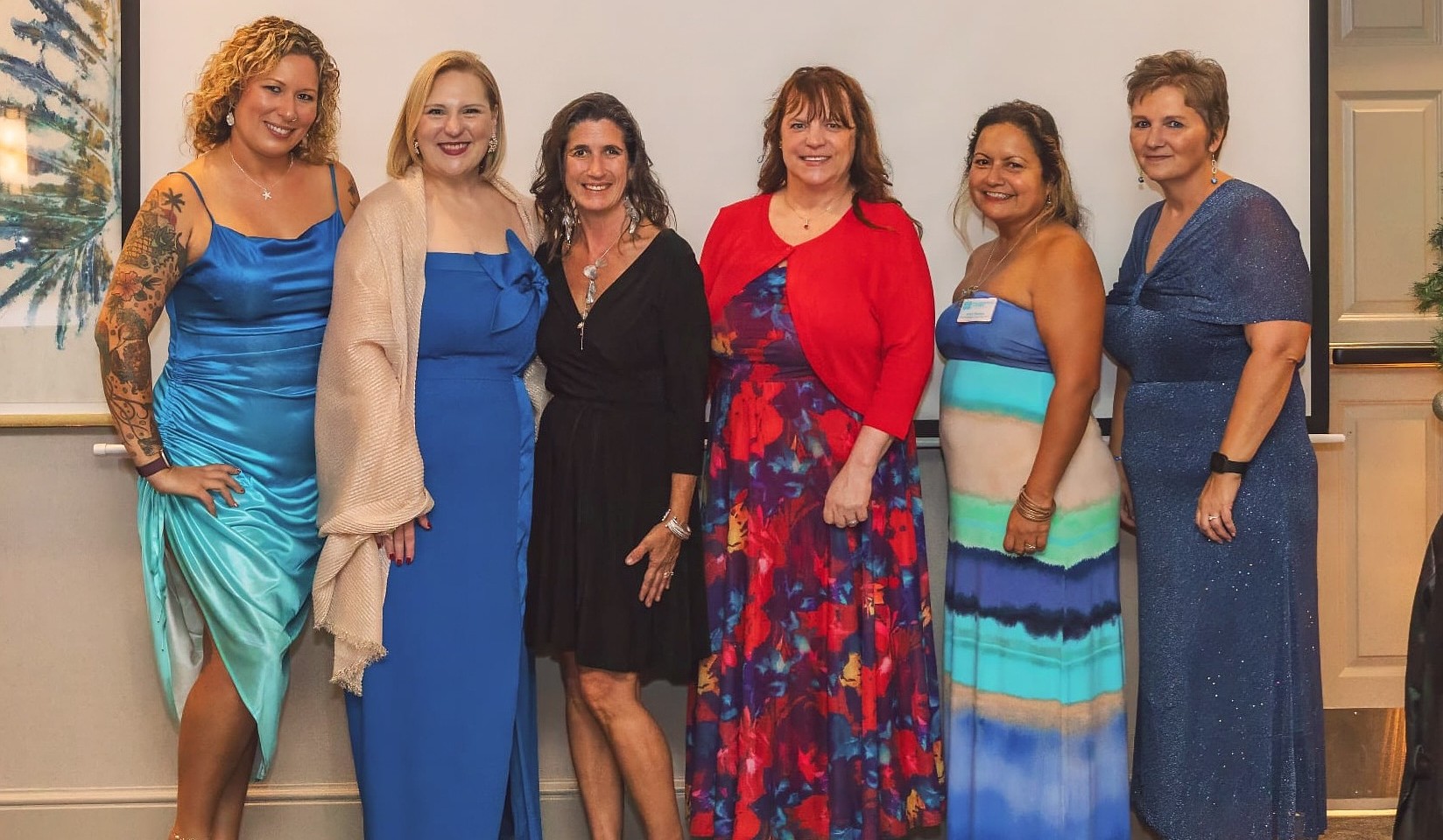 The 2025 PWFC Board: Erikq Equizi, Kelly Chapman, Kay Click, Tracie Cotto, Amy Dumas and Vanessa Cole. Photo by April Newman Ryan with Salty Mermaid Photography
