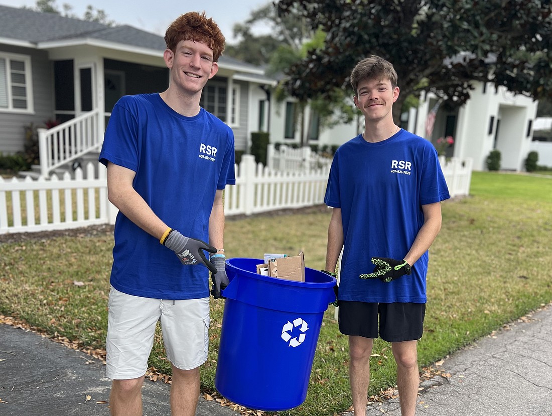 Kyle James and Mat Bowling collected Ready, Set, Recycle’s first bins. In the future, they hope to run their own employees for the business.