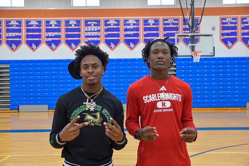 Chakai Scott and Devonte Anderson played all four years of varsity football together and celebrated continuing their careers Wednesday, Dec. 3. Chakai Scott and Devonte Anderson played all four years of varsity football together and celebrated continuing their careers Wednesday, Dec. 3.