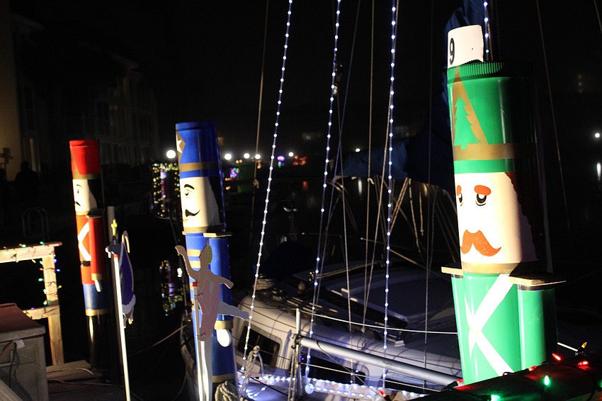 Custom-made nutcracker statues keep watch over Longboat Harbour at the Lighting of the Docks.
