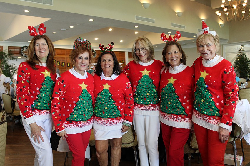 Denise Schwemmer, Debbie Rand, Vita Bea, Janice Reiser, Deborah Gardner and Noreen Ackerman participate in this year's Frosty Frolic golf tournament held Dec. 9 at the Harbourside Golf Course.