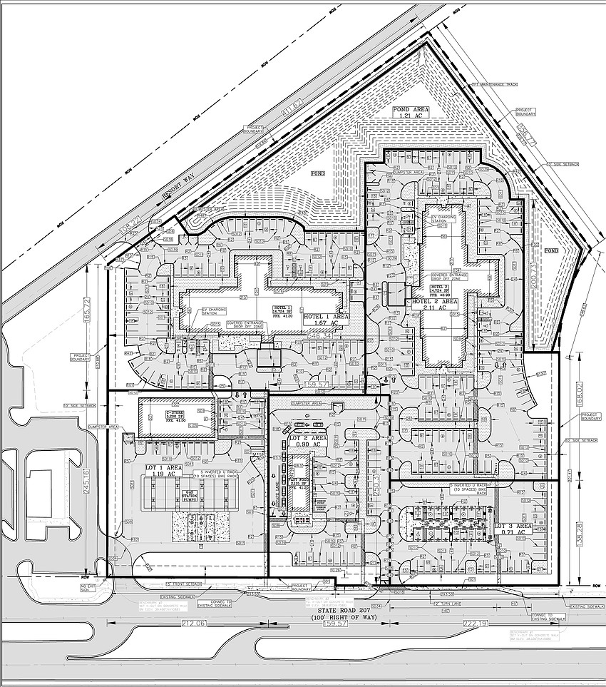 A plan shows hotels, a convenience store, a quick-service restaurant and EV chargers along north Florida 207 east of Interstate 95 in S. Johns County. It is adjacent to the south of the Florida National Guard Armory. A plan shows hotels, a convenience store, a quick-service restaurant and EV chargers along north Florida 207 east of Interstate 95 in S. Johns County. It is adjacent to the south of the Florida National Guard Armory.