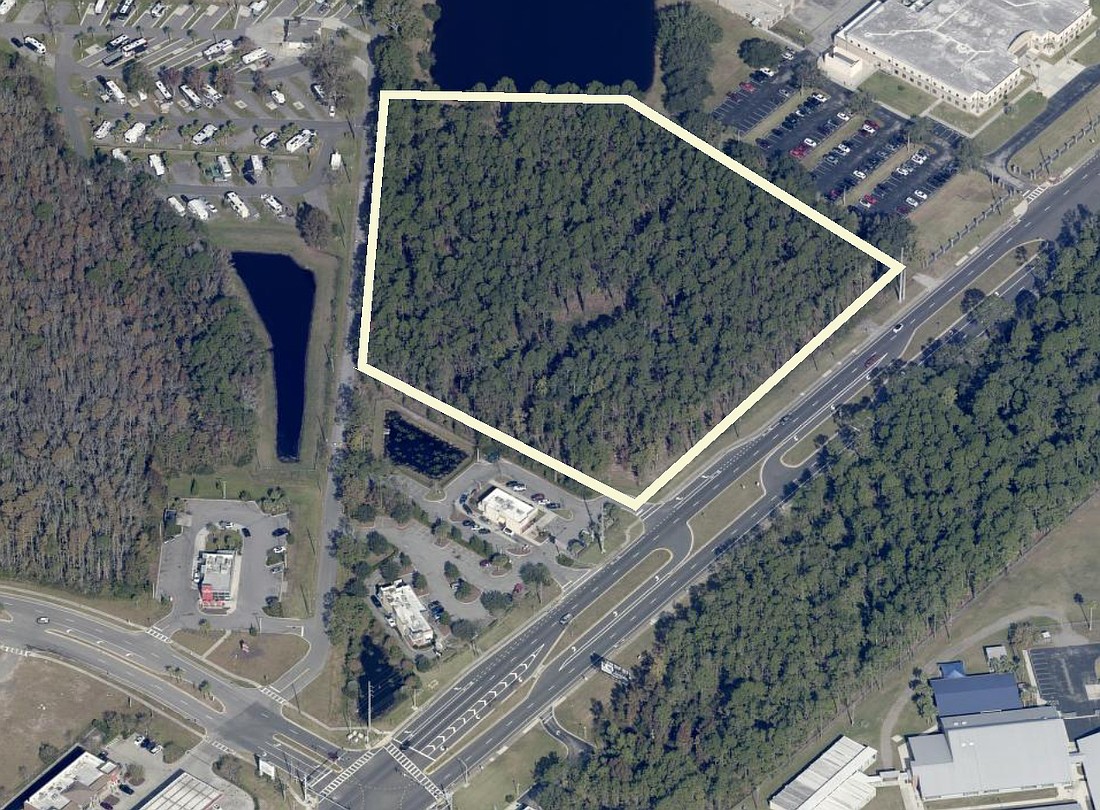 The site of a hotel project on property along Florida 207 in St. Johns County is between the Florida National Guard Armory and a Dunkin'. Otis A. Mason Elementary School is across the street.