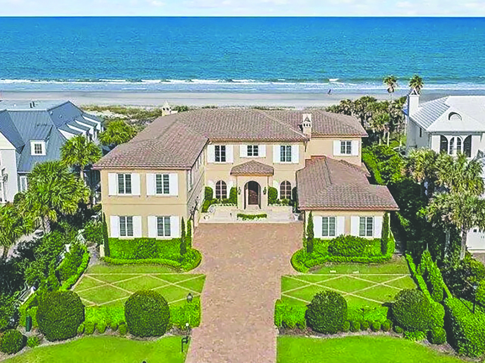 Oceanfront two-story home features six bedrooms, six full and one half-bathrooms, wine cellar, elevator, porch, balcony, deck and pool.