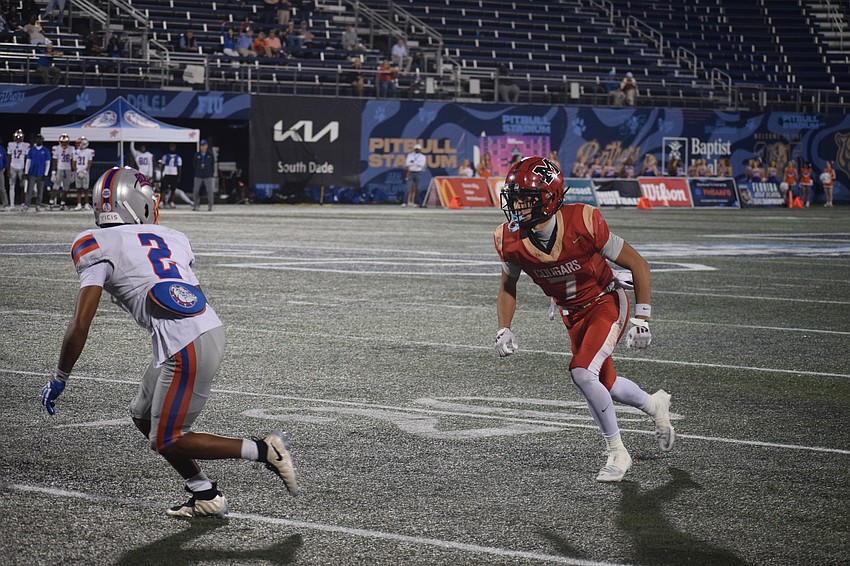 Bo O'Daniel begins his route opposite Santana Starks. The senior wide receiver reeled in three touchdowns to help topple Bolles, just five days after catching two in Cardinal Mooney's state semifinal victory over Cocoa.