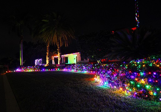 This house on the corner of Wedge Lane and Bogey Lane takes the cake for one of the most colorfully decorated homes on Longboat Key this season.