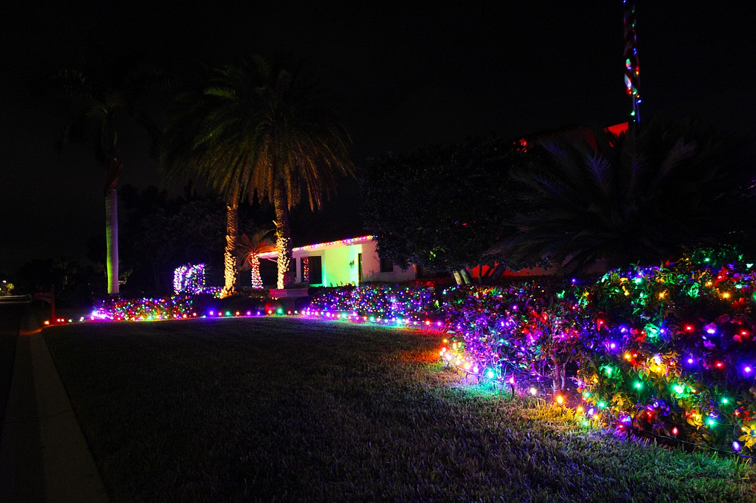 This house on the corner of Wedge Lane and Bogey Lane takes the cake for one of the most colorfully decorated homes on Longboat Key this season.
