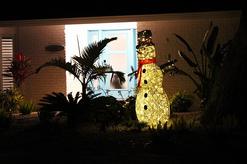 This house at 621 Buttonwood Drive wins the award for cutest snowman decoration this holiday season.