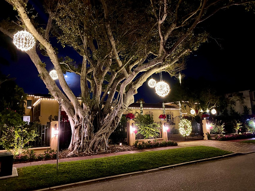 This St. Armands Key home glows with holiday spirit on the corner of S. Washington Drive and John Ringling Blvd.