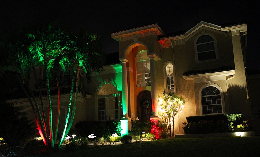 Simple yet classy red and green lights illuminate this home in the Bogey Lane neighborhood.