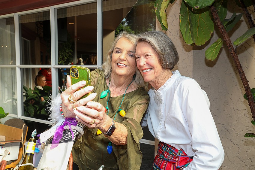 Nancy Raymond and Whitney Sale grab a selfie.