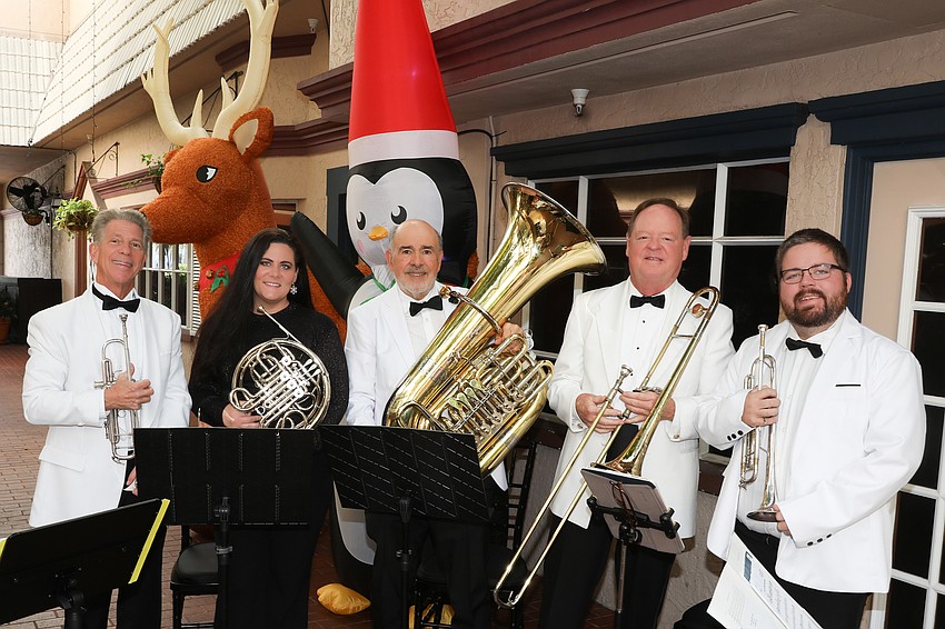 Victor Mongillo, Andrea Bella, James Damoulakis, Dan Dodds and Chris Leiper perform as The Pops Orchestra Brass Quintet.
