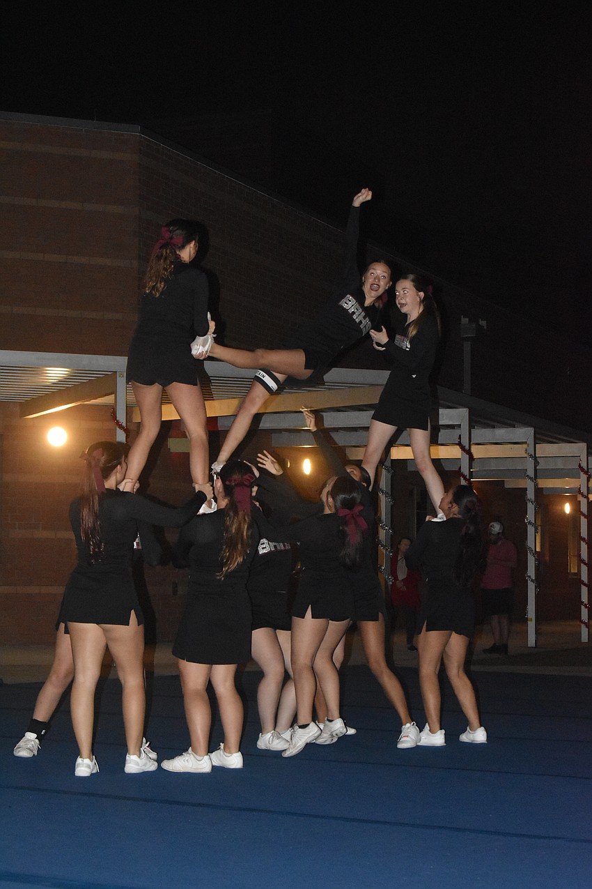 Braden River High School cheer team performs for attendees of River Wonderland on Dec. 8.