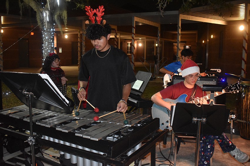 Braden River High School Jazz Band members Cein Mejia and John Franco perform at River Wonderland.