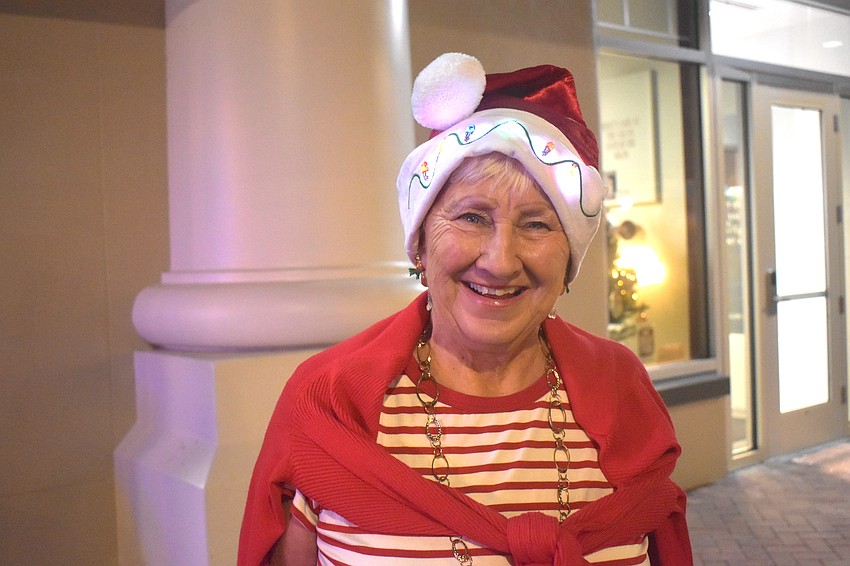 Phyllis Haan dresses in red, green, white and black the whole month of December.