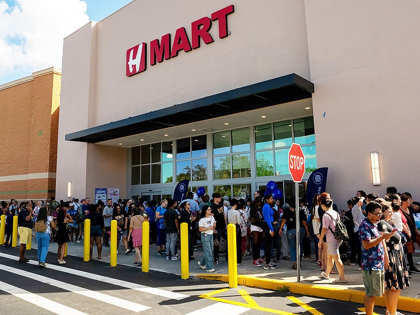 Crowds line up to enter the H Mart in Orlando. The store opened in September in a former SuperTarget space. Crowds line up to enter the H Mart in Orlando. The store opened in September in a former SuperTarget space.