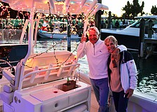 Gary and Linda Condon of Bird Key decorated their boat to contribute to the beauty of this year's Blessing and Lighting of the Fleet on Dec. 11.