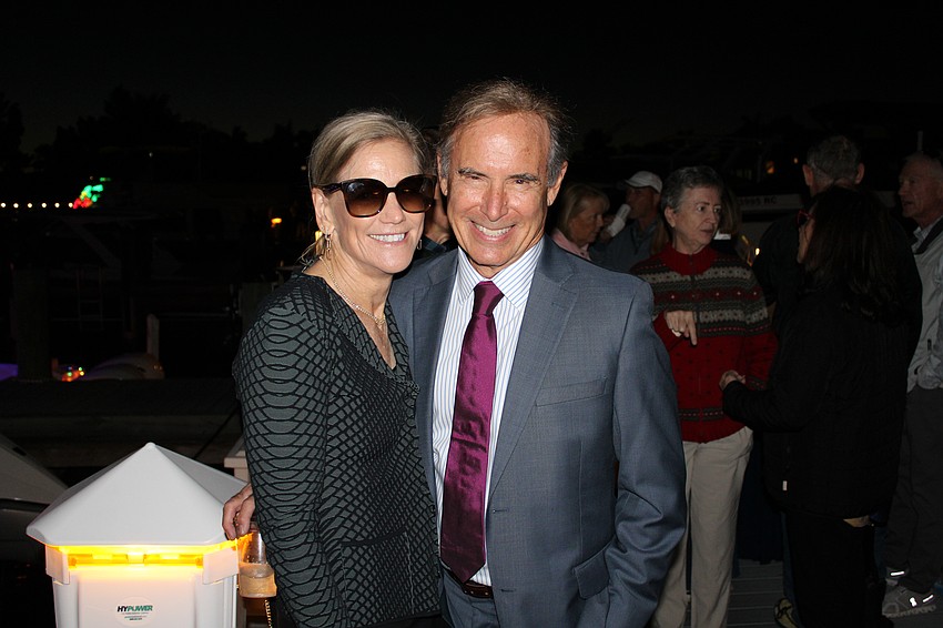 Cindy Swanson and Michael Kutner celebrated his birthday at the Blessing and Lighting of the Fleet.