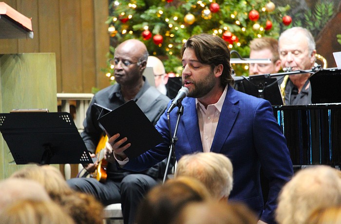 David Forester sings a solo of "Santa Claus is Comin' to Town" with The Venice Symphony for a big band-style Christmas concert on Dec. 12 at St. Mary, Star of the Sea, Catholic Church.