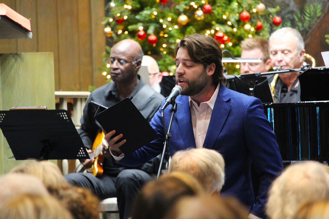 David Forester sings a solo of "Santa Claus is Comin' to Town" with The Venice Symphony for a big band-style Christmas concert on Dec. 12 at St. Mary, Star of the Sea, Catholic Church.