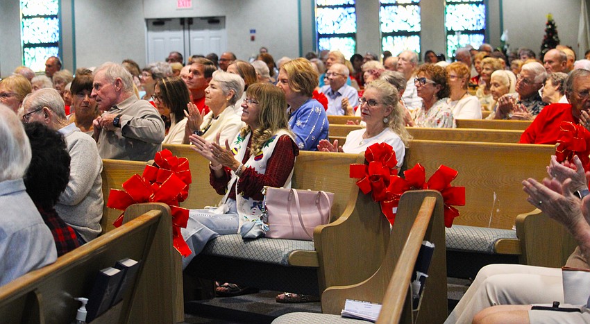 Concert attendees enthusiastically applauded tunes like Michael Bublé's version of 