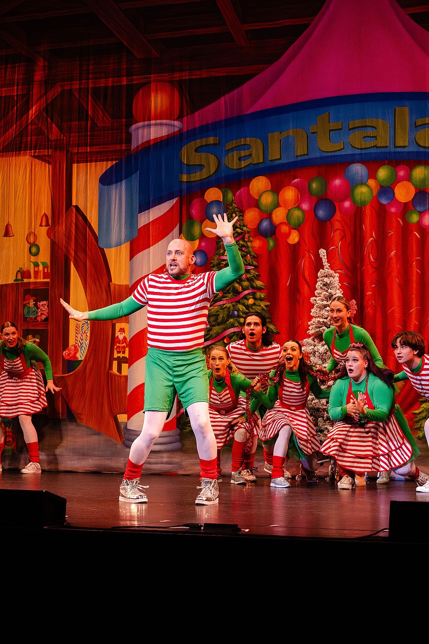 Justin Gomlak plays an elf in Santa's workshop in 