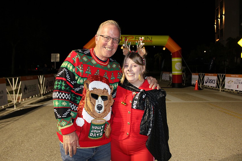 Scott Gingrich and Nikki Gingrich are looking festive before the start of the Jingle 5K in Lakewood Ranch.