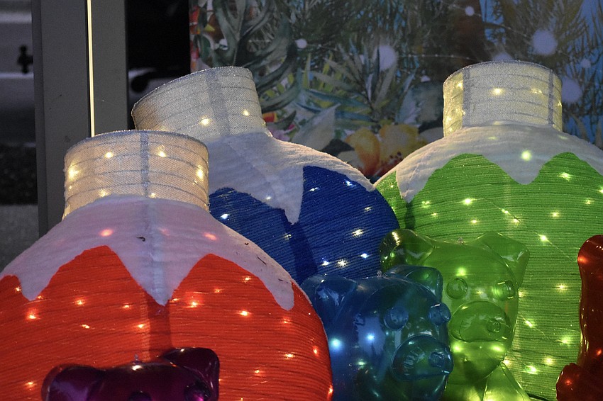 Oversize ornaments and gummy bears adorn the area where Santa Claus greeted kids and families.