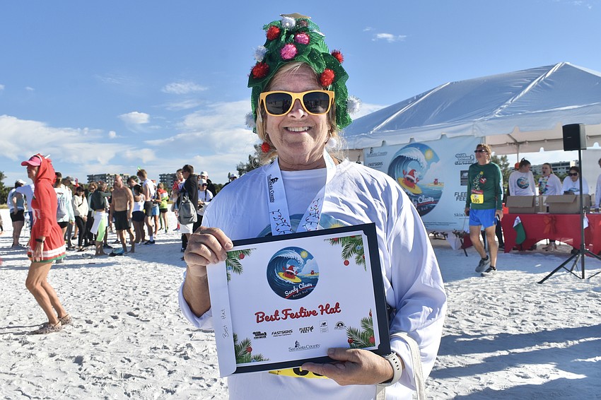 Carol Metzger holds her 