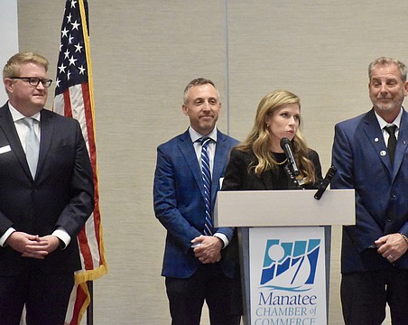 Manatee County administrators address the Manatee Chamber of Commerce Dec. 8. From left to right: Deputy county administrators Corey Stutte, Bryan Parnell, Courtney De Pol and County Administrator Charlie Bishop.