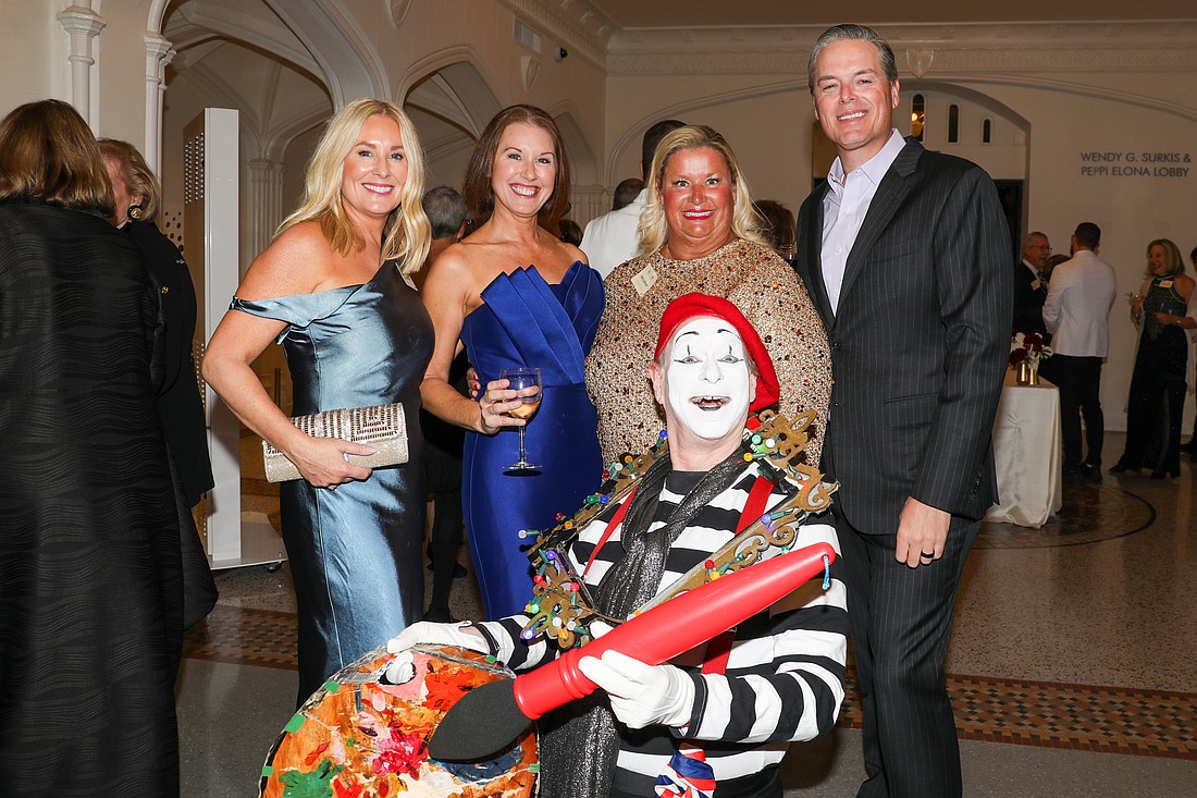 The World of Chucko photo-bombs Dana Dalpra, Lauren Hersh and Tami and Phillip Lanham.