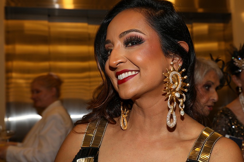 Umbreen Khalidi Majeed shows off her earrings for the evening.