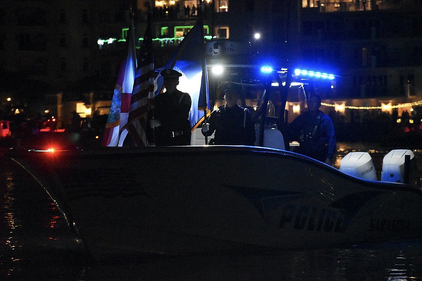 The honor guard leads the parade.