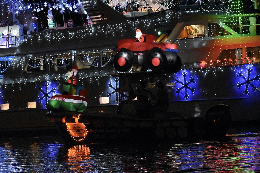 Brown-Eyed Girl passes in front of Lotus Yachts