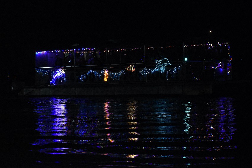 Decorations on Explorer V reflect on the water.