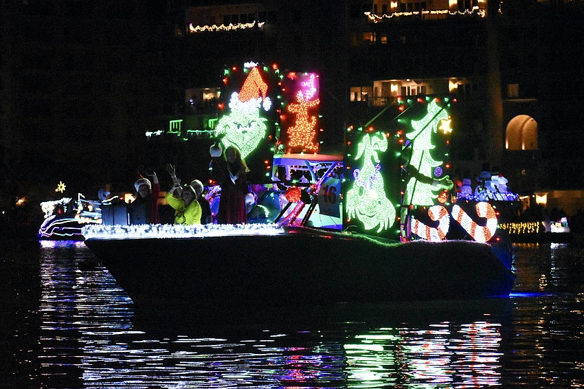 The boat Wayne's World, which had a Grinch theme, approaches.