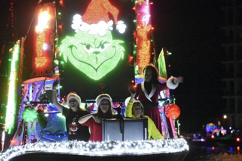 The boat Wayne's World, which had a Grinch theme, approaches.