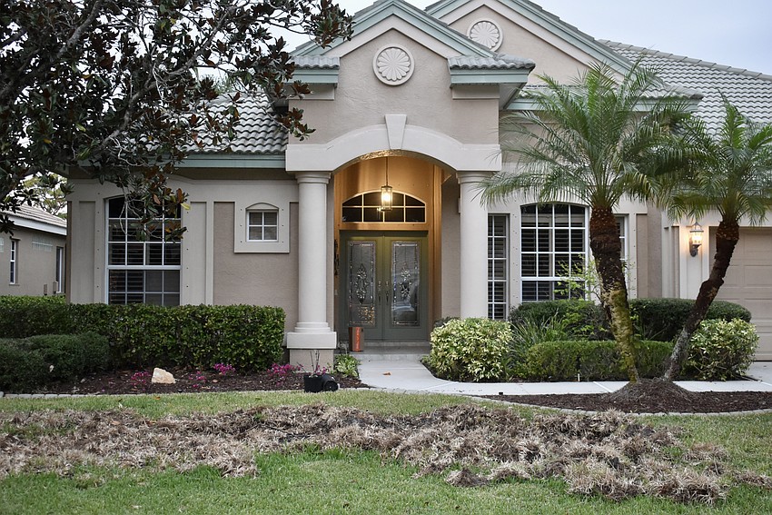 This is one of several yards in the Santuary at River Club that have been torn up by feral hogs.