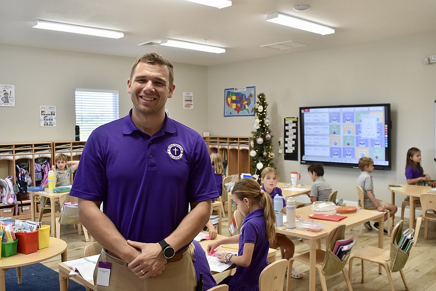 Dillon Solomon doubles as the second grade lead teacher and the principal.