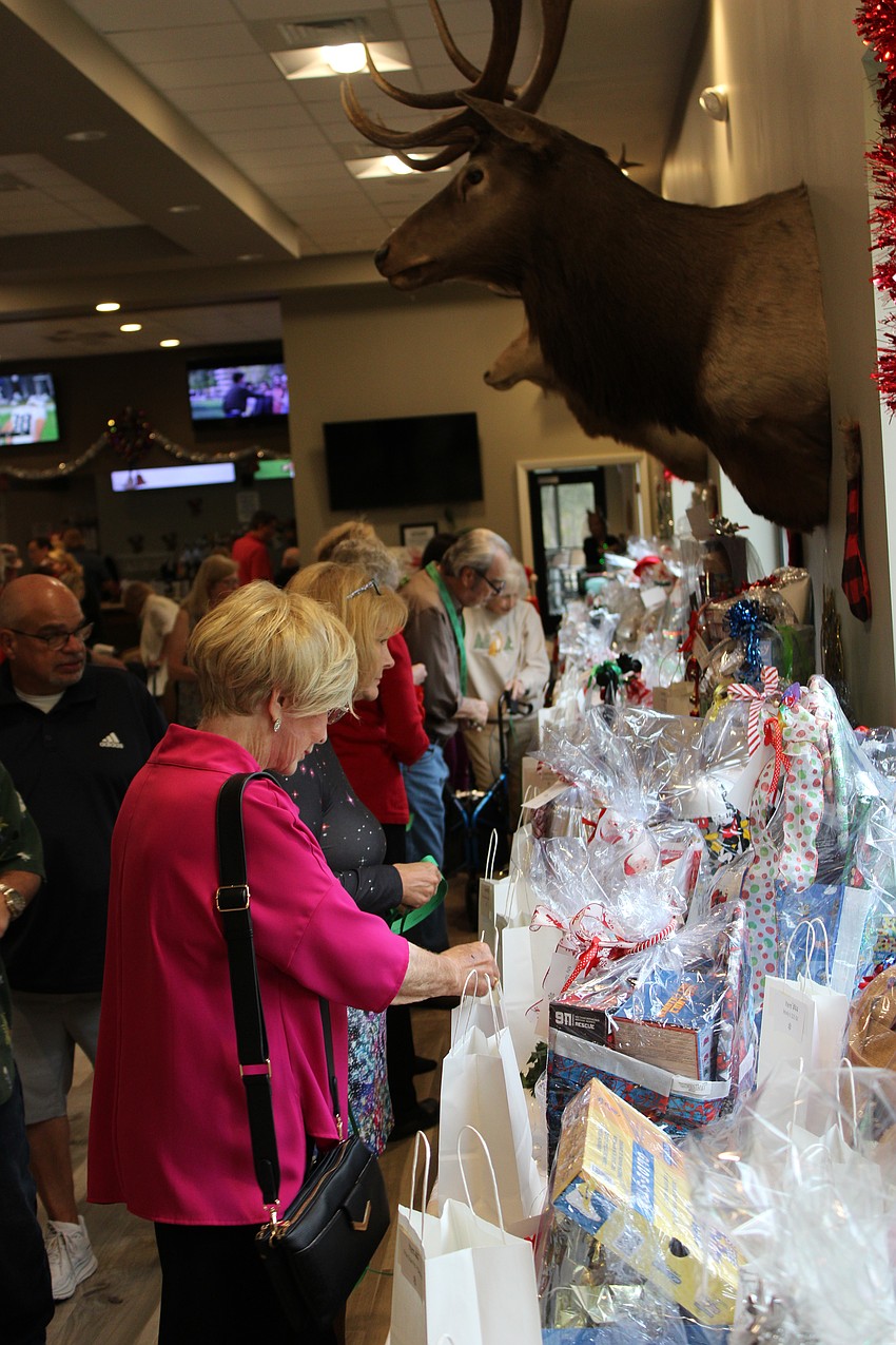 More than 50 raffle baskets were offered at the 20th annual Community Holiday Shoebox Collection Drive and Reception Dec. 13.